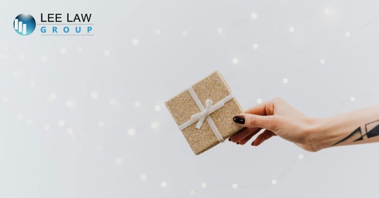 hand holding a holiday gift